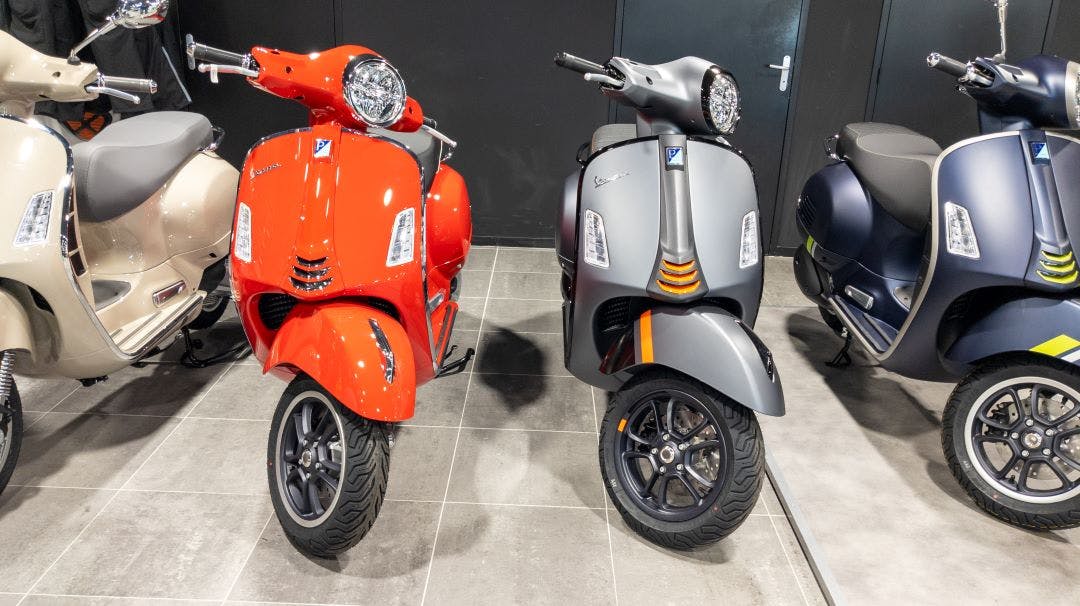 vespas at a dealership Your Guide to Riding a Vespa Scooter