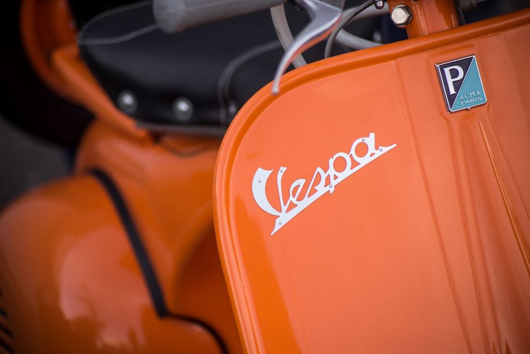 vespa logo upclose Your Guide to Riding a Vespa Scooter