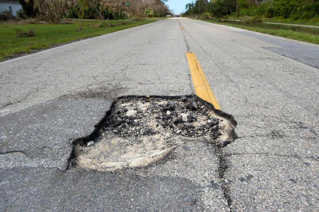 pot hole What Hazards Might a Motorcyclist Encounter on the Road?