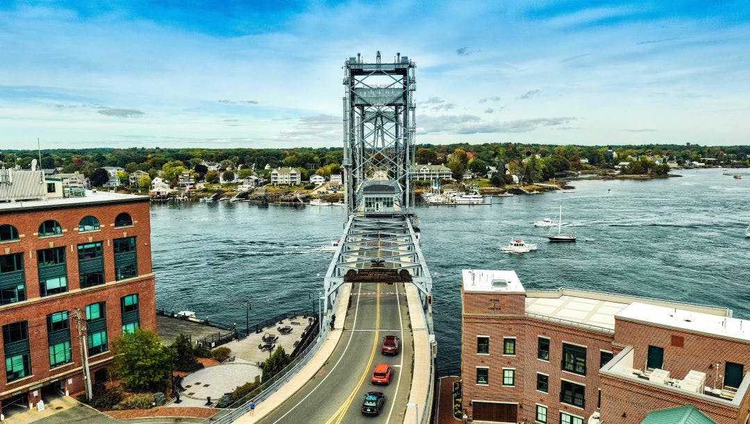 Aerial view of a historic bridge over the water in Portsmouth, New Hampshire Top Northeastern USA Motorcycle Destinations