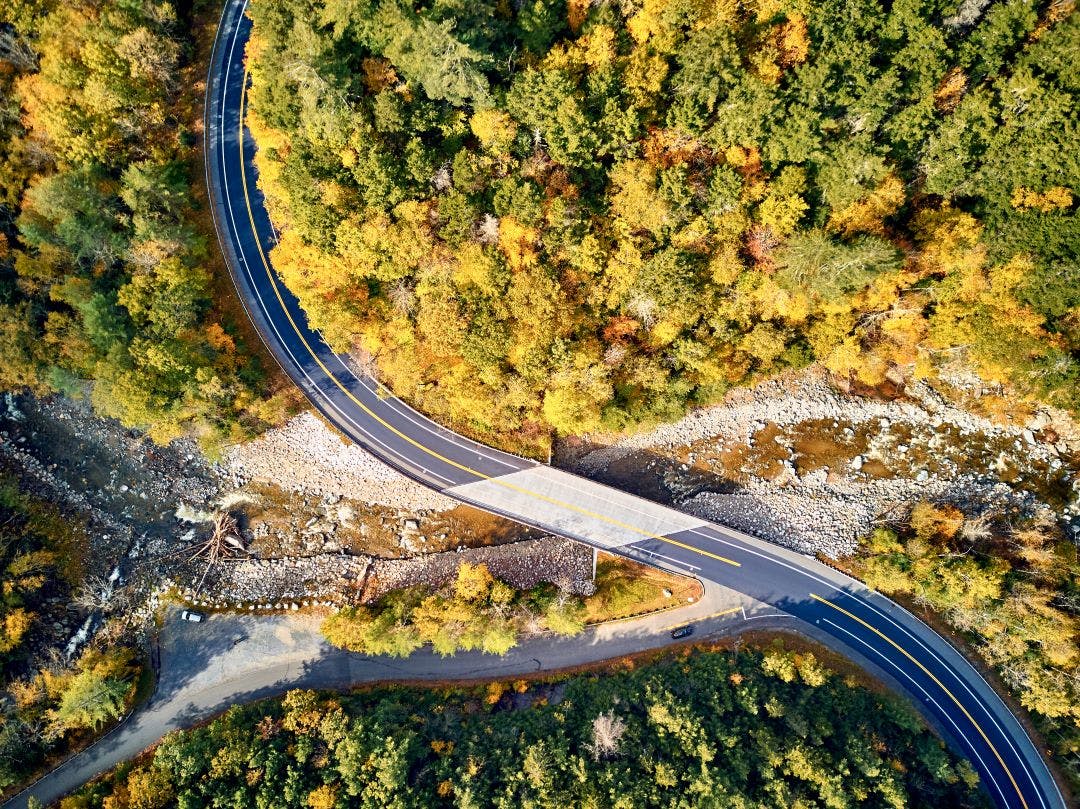 Scenic Mohawk Trail winding highway at autumn, Massachusetts, USA. Fall in New England. Aerial drone shot. Top Motorcycle Rides in Massachusetts