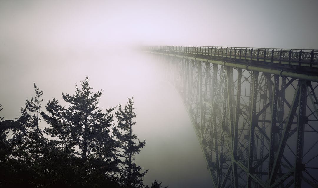 Fog Enveloping Deception Pass Bridge, Whidbey Island The Perfect Pacific Northwest Motorcycle Trip