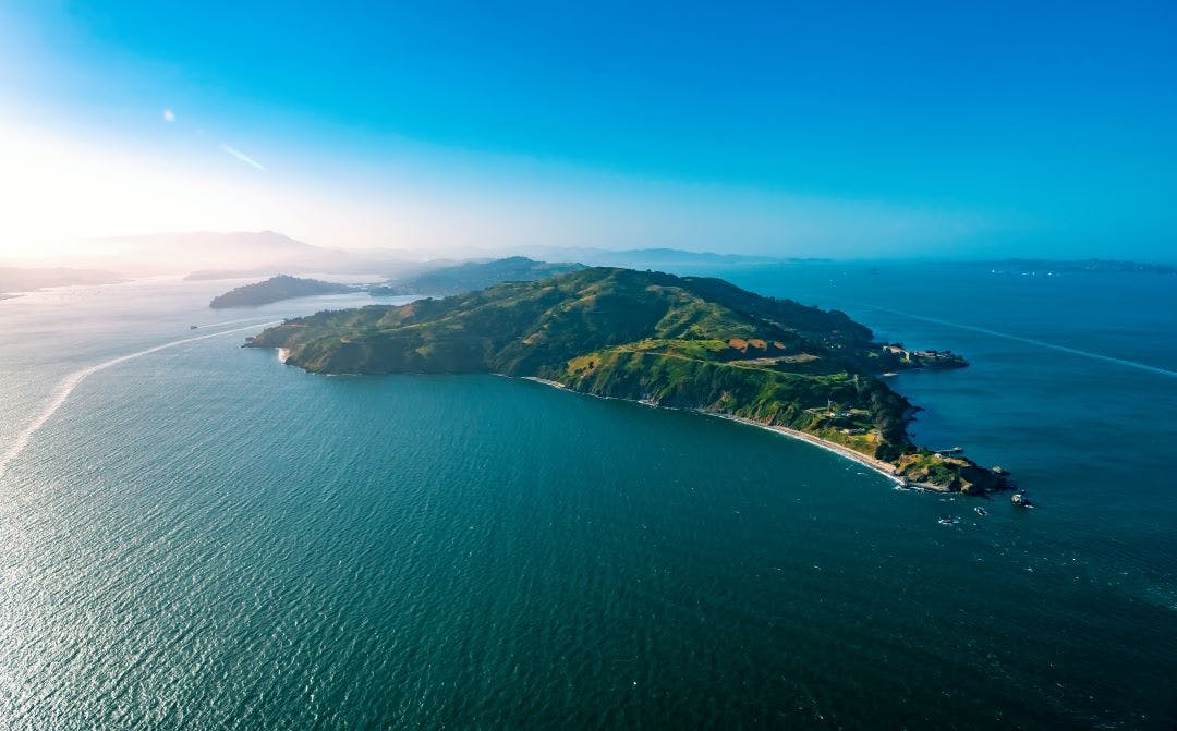 Aerial view of Angel Island at sunset off the coast of San Francisco Discover the Most Worthwhile Day Trips from the San Francisco Bay Area