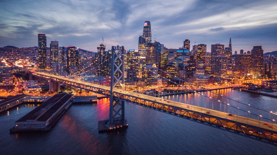 Aerial cityscape view of San Francisco and the Bay Bridge at Night Discover the Most Worthwhile Day Trips from the San Francisco Bay Area