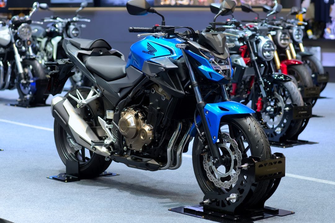 Honda CB500F sport motorbike model on display Yamaha vs. Honda Motorcycles - How Do They Stack Up?