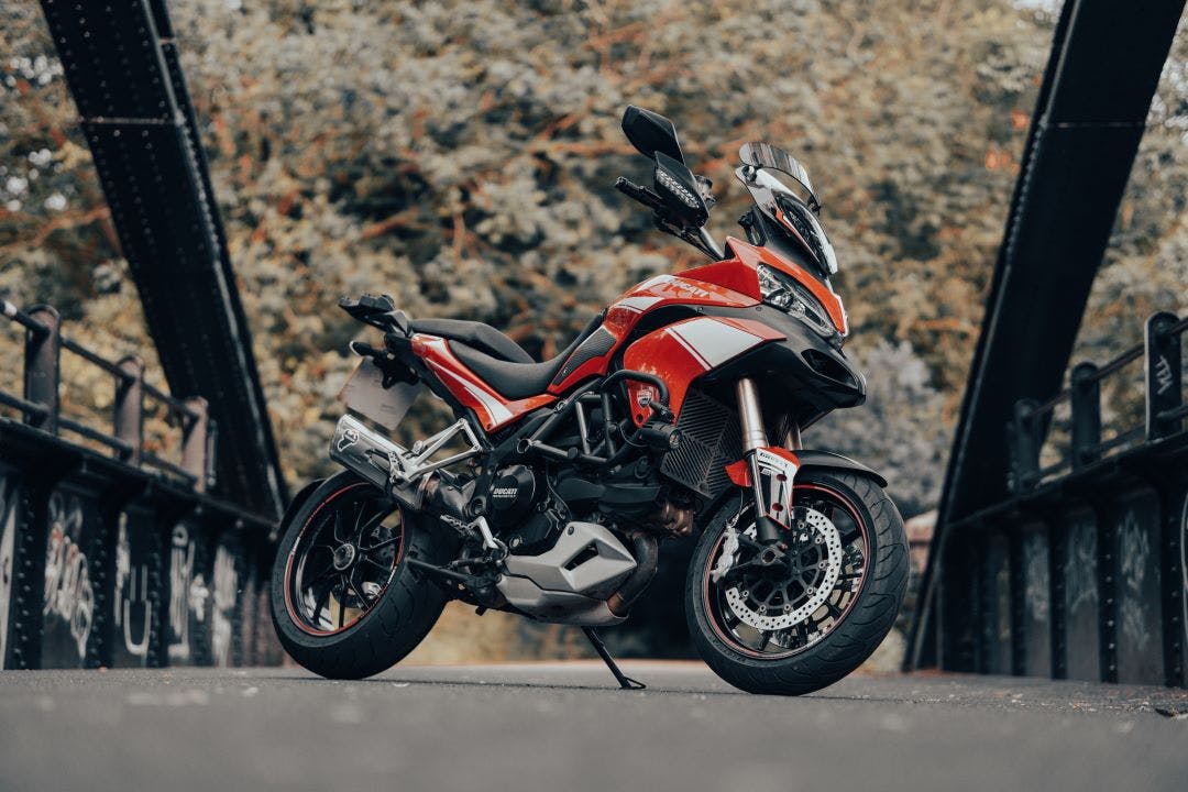 Ducati Multistrada V2 1200cc motorcycle red adventure bike touring motorbike large powerful vehicle fast off-road motorcycle Dual Sport vs. Adventure Bikes - Let's Break It Down