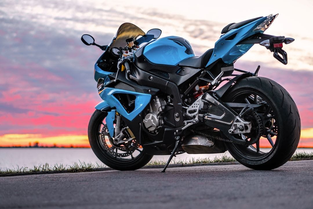 Sports motorcycle on the shore at sunset The Best 600c Sport Bikes of 2024-2025