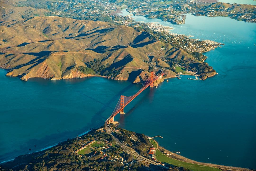 Aerial view of the Golden Gate Bridge in San Francisco with Sausalito in the background Your Guide to Riding a Motorcycle in San Francisco & The Bay Area