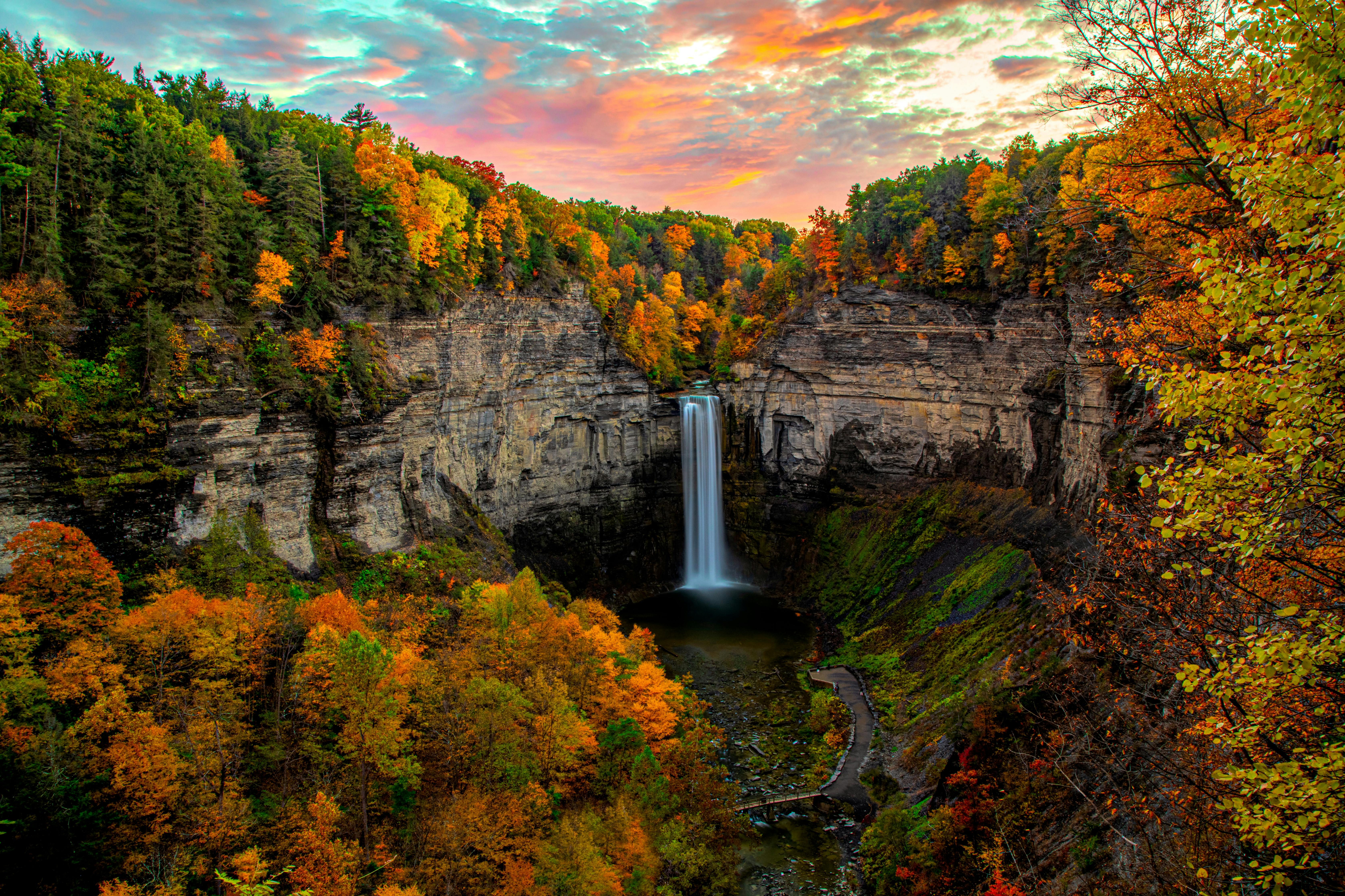 upstate new york is one of the best places to go in October in america- see beautiful fall foliage with waterfall