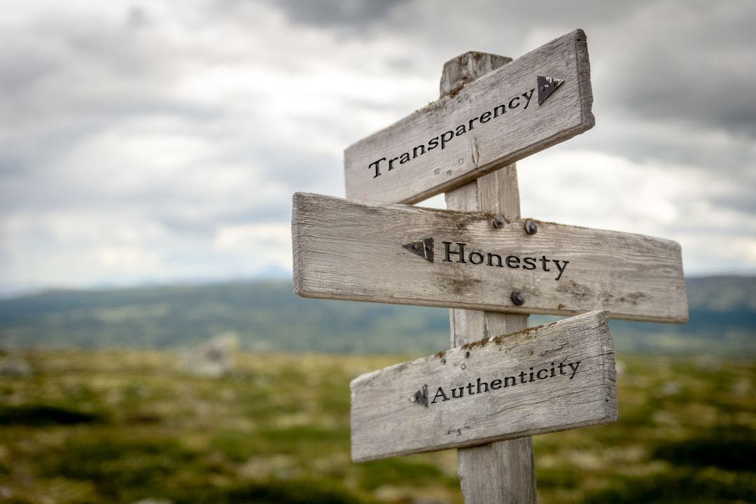 transparency honesty authenticity text quote on wooden signpost outdoors in nature Hidden Fees in Motorcycle Rentals? No Thanks!