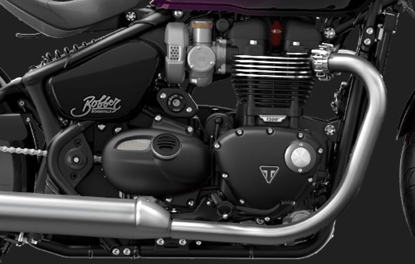 Triumph Bonneville Bobber engine close up Harley-Davidson Fat Boy 114 vs. Triumph Bonneville Bobber