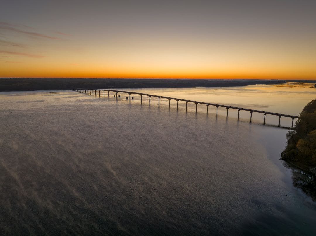 Natchez Trace National Parkway crosses the Tennessee River - John Coffee Memorial Bridge, aerial view at sunrise Beginner-Friendly Motorcycle Tours in the United States