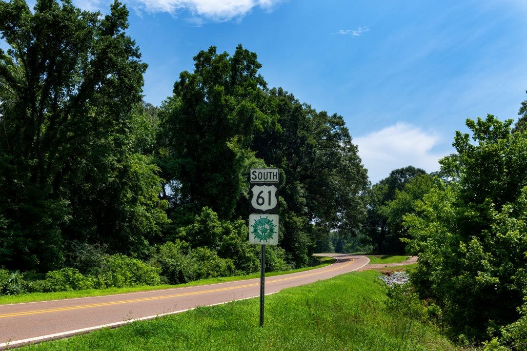 A Great River Road Sign along the US Route 61 near the city of Vicksburg, in the State of Mississippi; Concept for travel in America and road trip in America 10 Most Memorable Self-Guided Motorcycle Tours in the USA