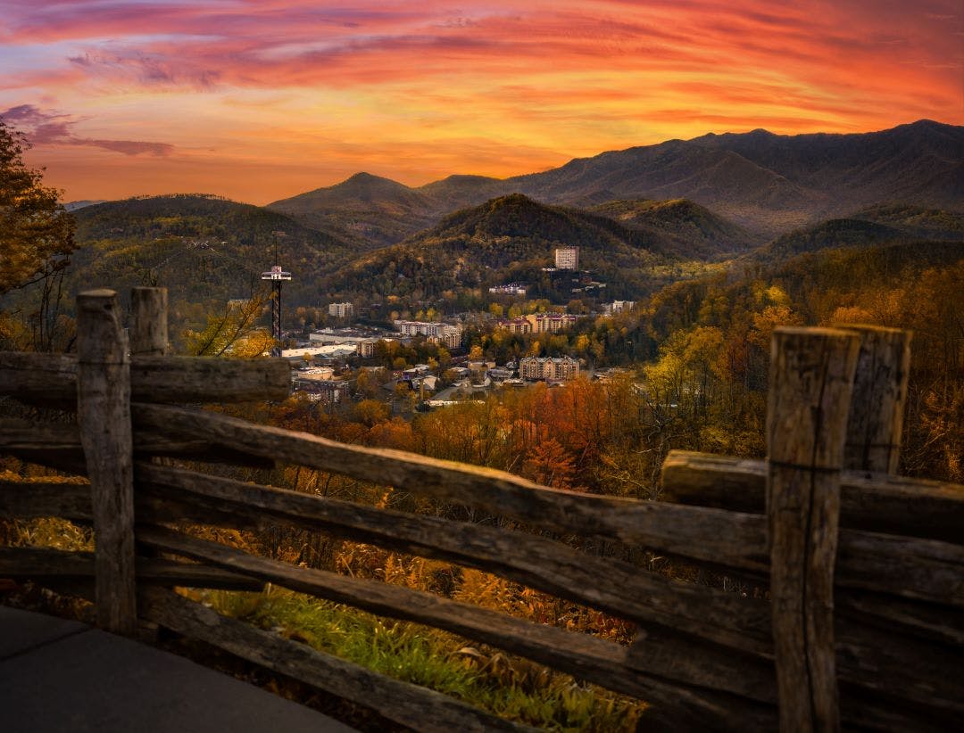 Gatlinburg overlook during brilliant red sunset 13 Scenic Locations to See Autumn Foliage in Tennessee