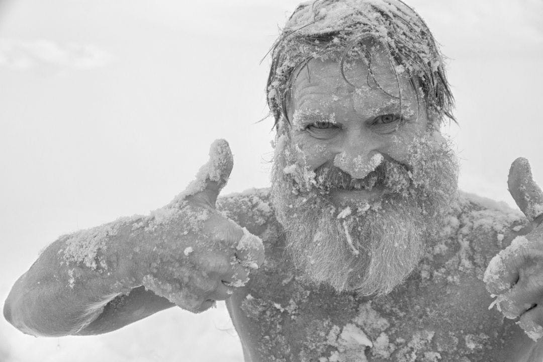 Bearded man freezing in the snow Riding a Motorcycle in the Winter: Can You? Should You?