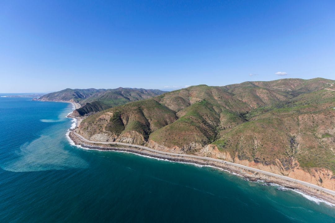 Aerial view of Pacific Coast Highway near Sycamore Cove north of Malibu California Beat the Cold With These Winter Motorcycle Destinations