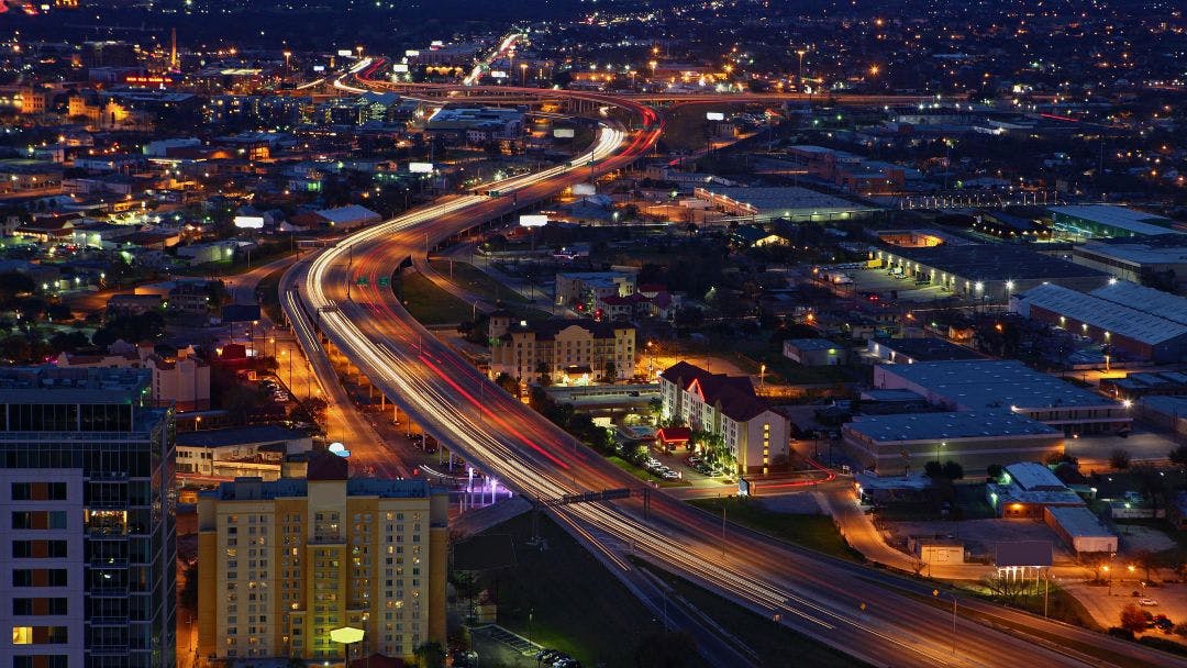 Aerial of San Antonio, Texas expressways at night Is San Antonio, Texas, a Good Place to Ride Motorcycles?