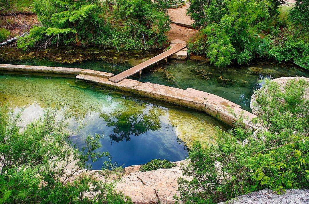 Jacob's Well, Wimberley Texas is a famous swimming hole in the Hill country Best 15 Day Trips from San Antonio, Texas