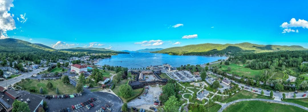 Panoramic aerial view of Lake George New York Americade 2025 Dates & Info | Lake George Motorcycle Rally