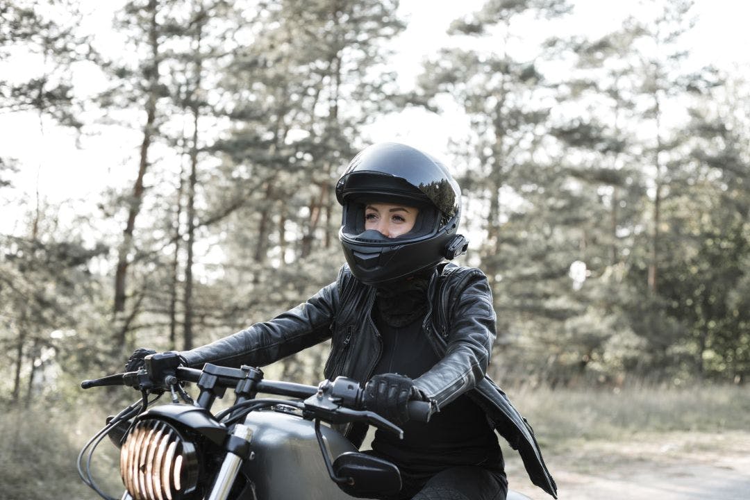 Young woman driving motorcycle Motorcycle Rentals & the Gender Gap – Improving Equity