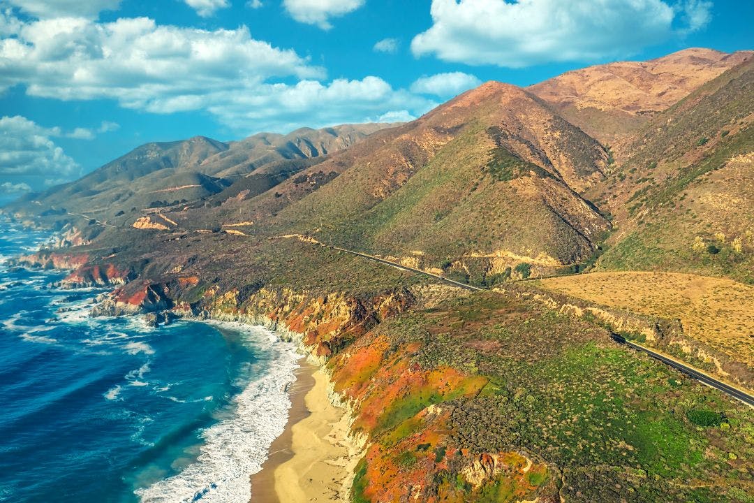 aerial view from drone beautiful coastal landscape on pacific highway Best West Coast Motorcycle Trips – Ultimate Itineraries