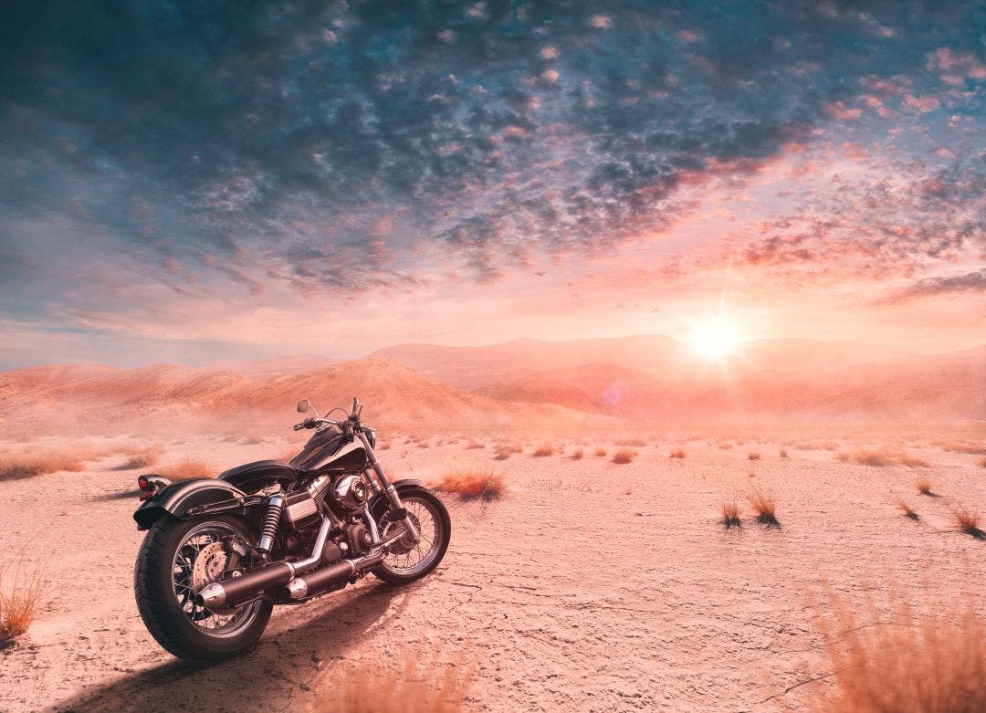 Enjoy the freedom with your harley davidson bike in the calm desert at sunset How to List a Motorcycle Tour on Riders Share & Make Money
