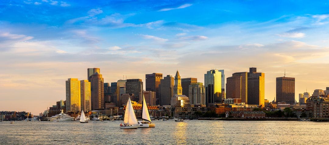 Boston cityscape at sunset 5 Best Motorcycle Day Trips from Boston