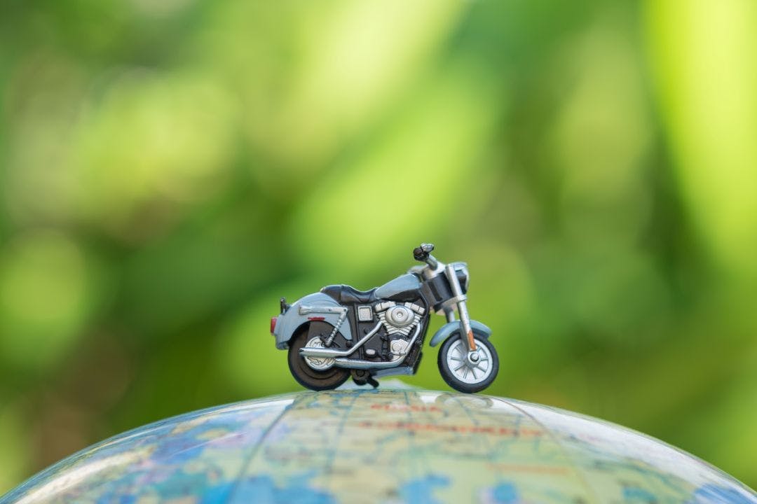motorcycle figure on globe 14-Day Route 66 Self-Guided Motorcycle Tour: All You Need