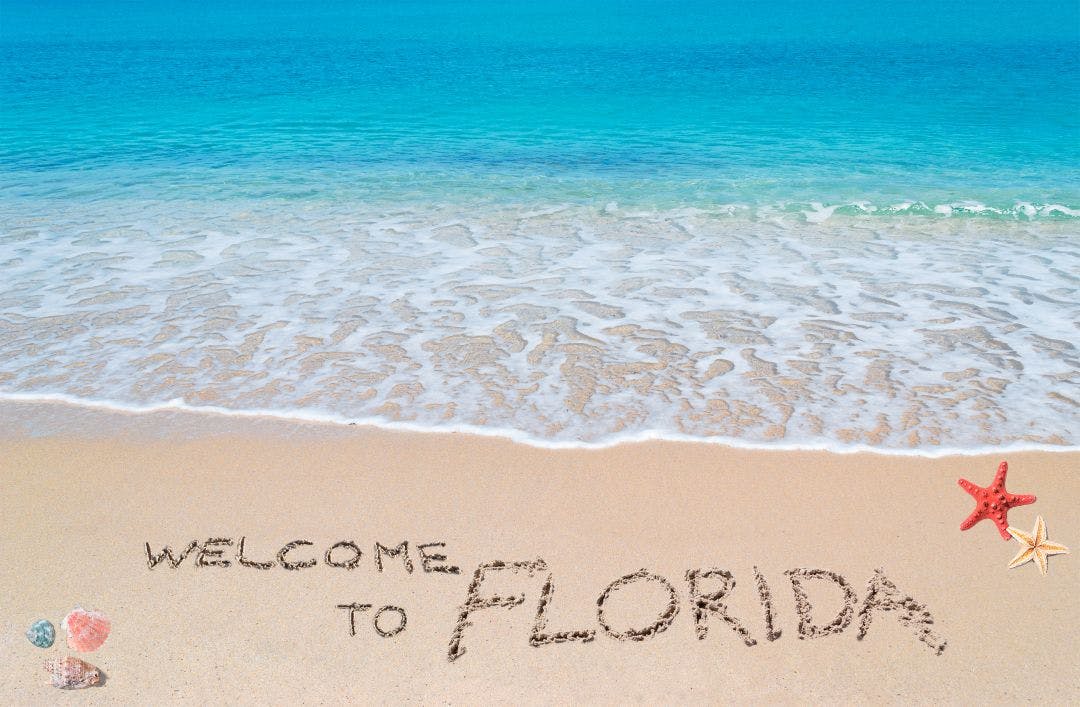 welcome to florida written in the sand on the beach Florida Motorcycle Rental Costs 2026: Prices by City