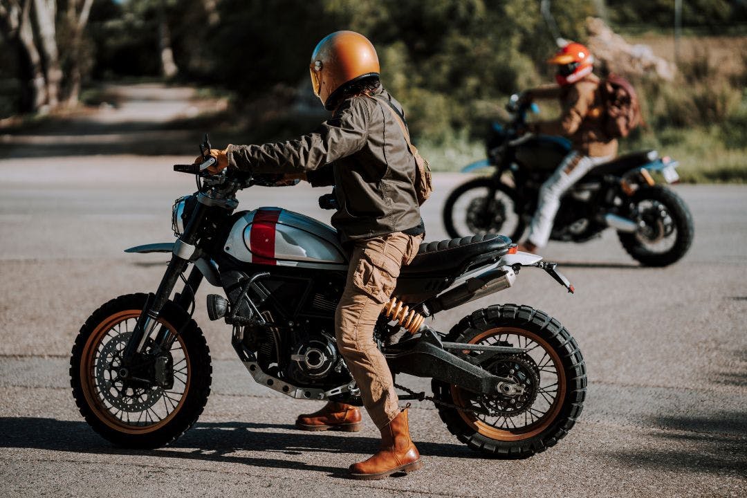 two people on adventure motorcycles on the street How ADV Bikes Are Dominating the Motorcycle Industry