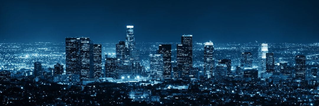 los angeles california city skyline at night time Harley-Davidson Rental Costs: Real Prices & Stats [2025]