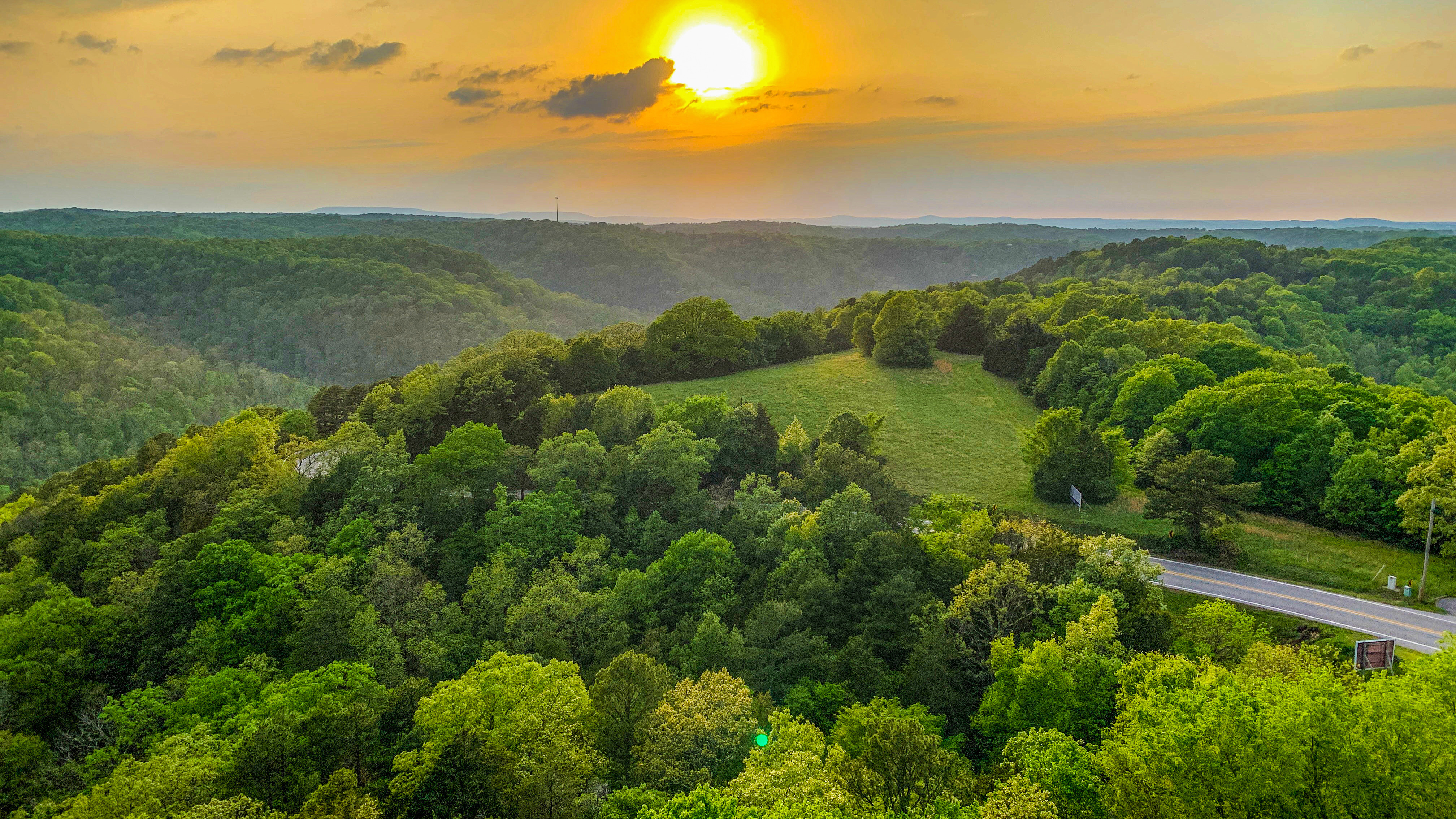 image of Sunset over the Ozark Mountains in Arkansas - book an arkansas motorcycle rental with Riders Share