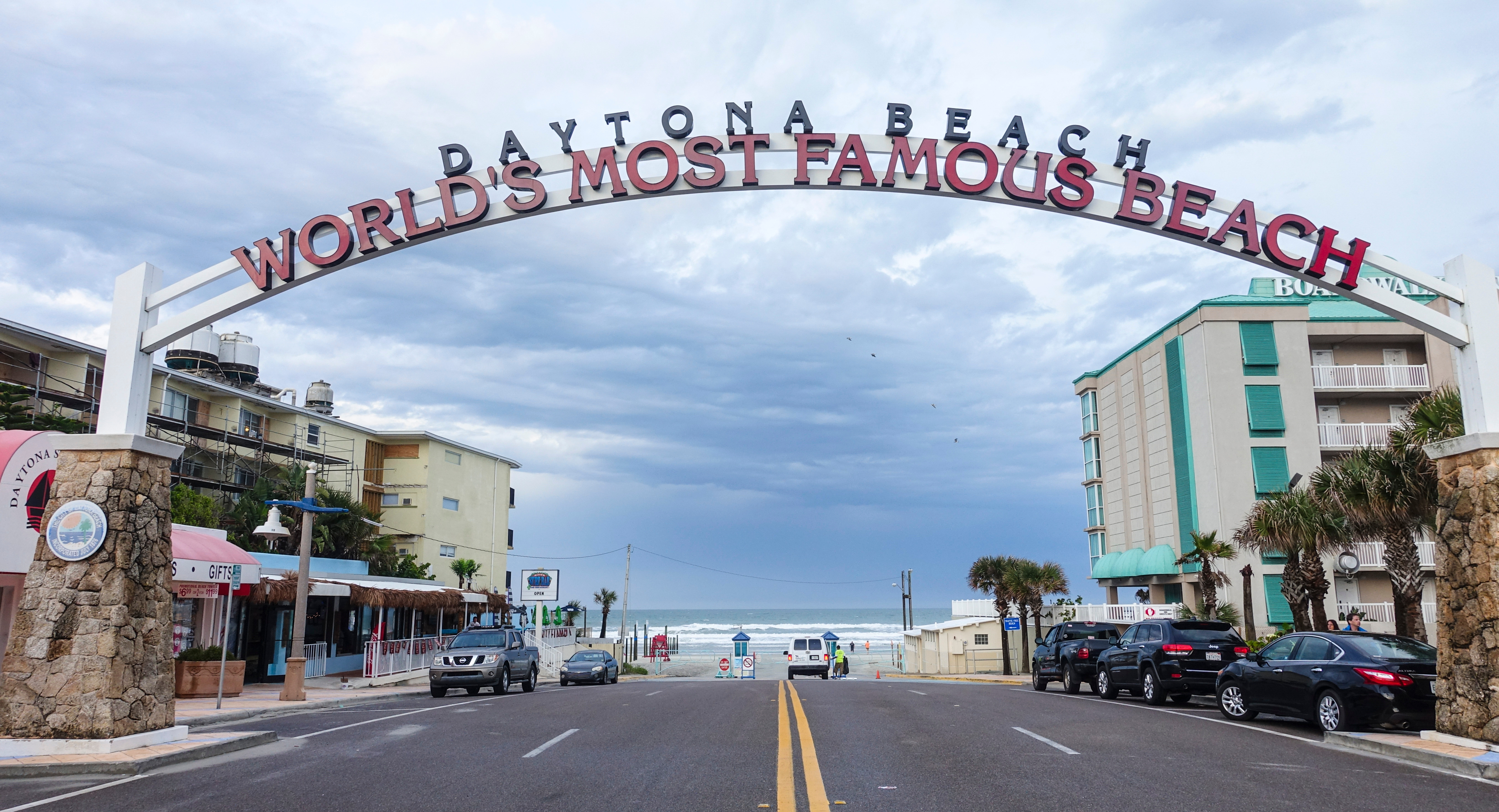 image credit: 4kclips - stock.adobe.com, image of beach sign in Daytona beach - book a daytona beach motorcycle rental with Riders Share