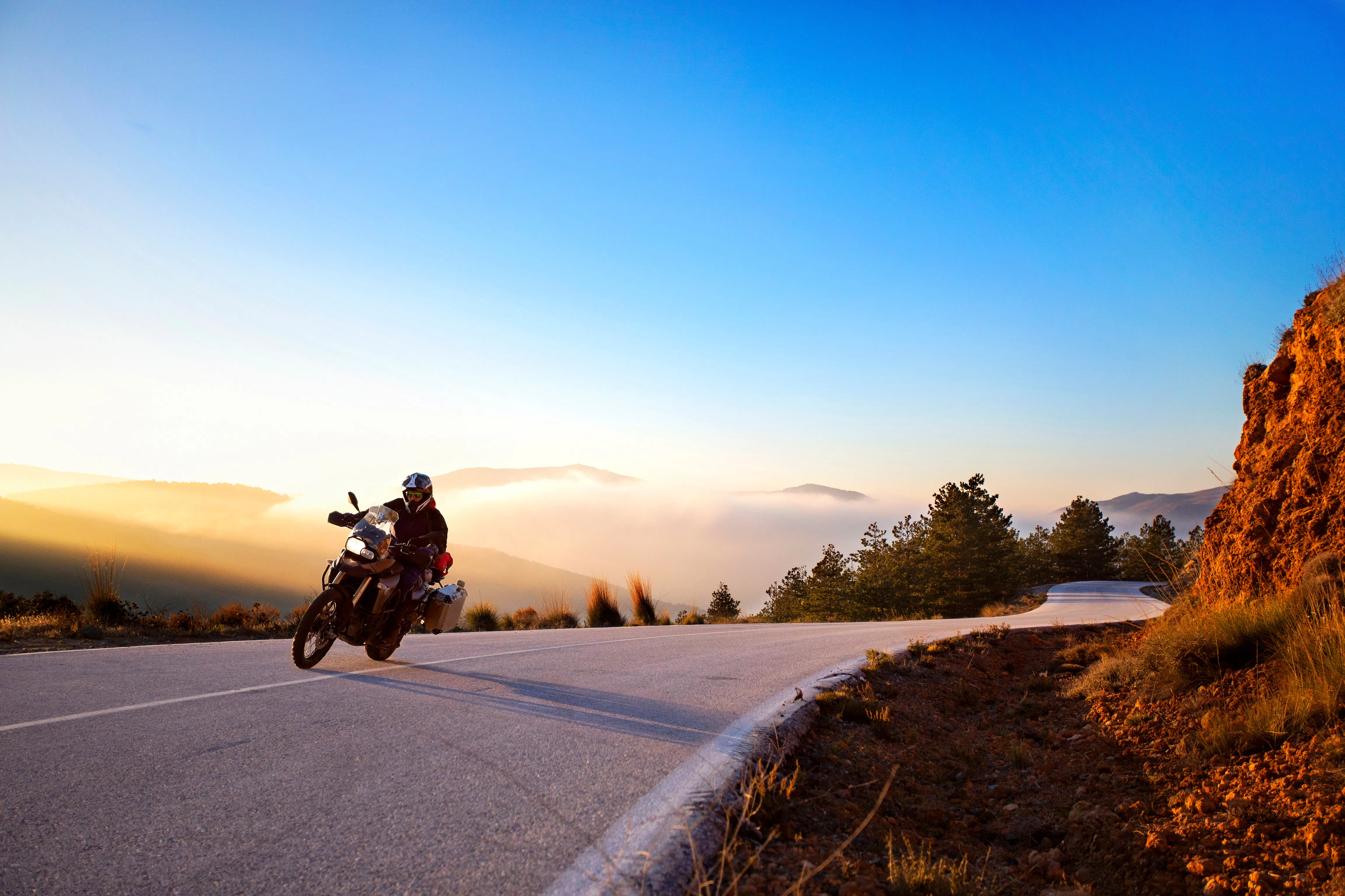 image of biker riding a motorcycle - how to rent a motorcycle for vacation