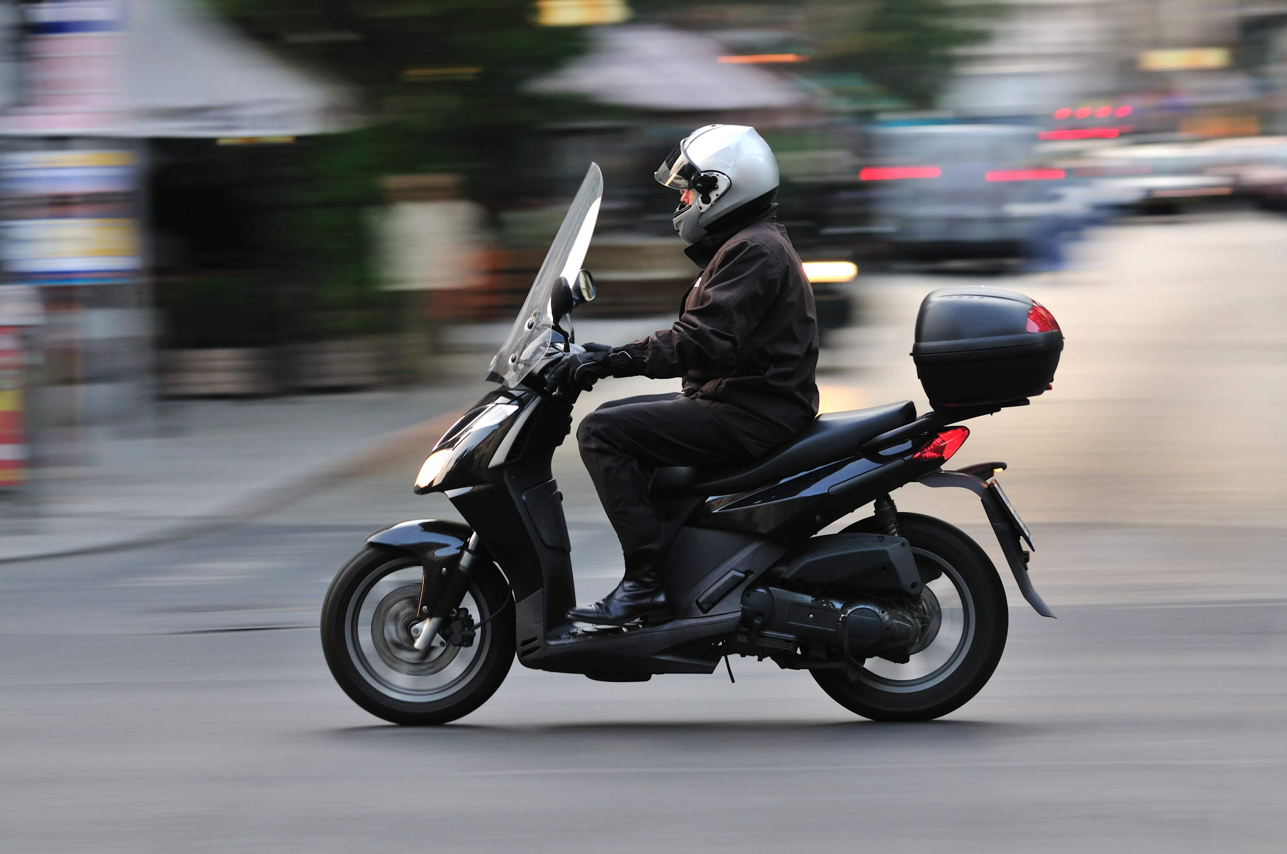 image of guy on an italian scooter - best italian scooter brands