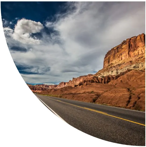 graphic image of utah road and mountains - compare utah motorcycle insurance quotes on Riders Share
