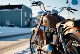 image of a motorcycle in snow - compare alaska motorcycle insurance quotes on Riders Share