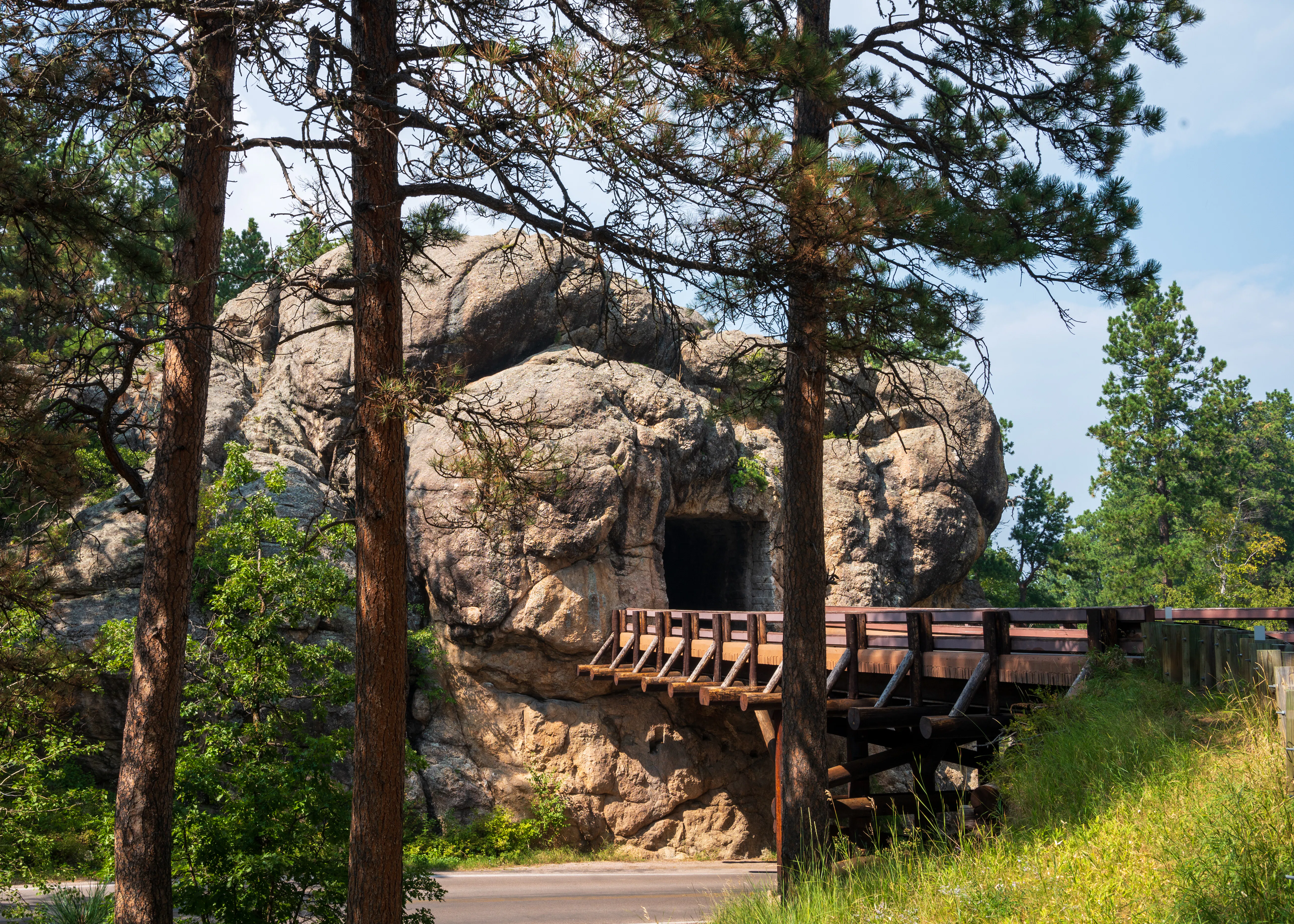 Iron Mountain Road in the Black Hills with one of its famous pigtail bridges and granite tunnels