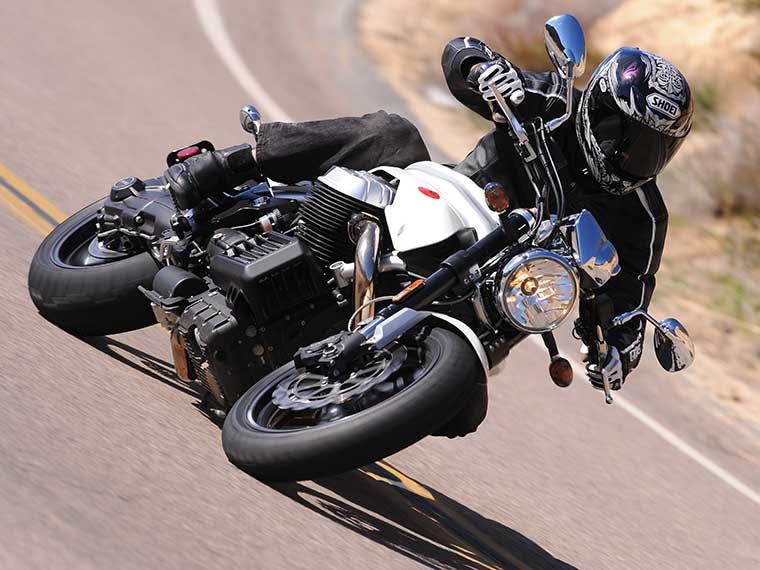 Man riding rented Moto Guzzi motorcycle.