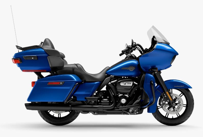 stock picture of a 2024 blue harley davidson road glide limited best touring motorcycles