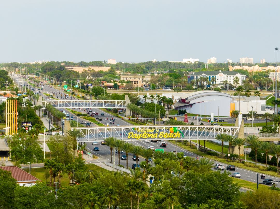 Aerial photo of Daytona International Speedway demo events during bike week travel to Miami