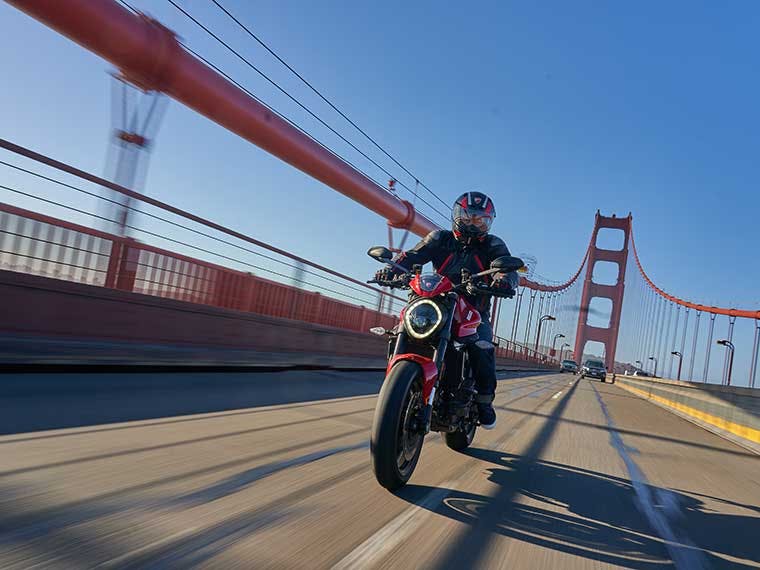 Ducati motorcycle ridden across the Golden Gate bridge.