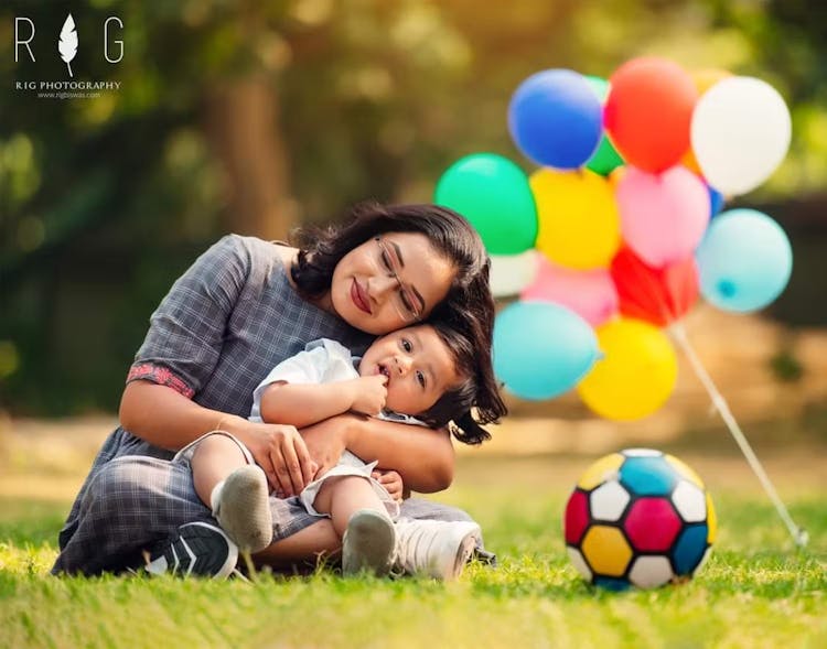 Mother hugging her newborn tight pic in a garden