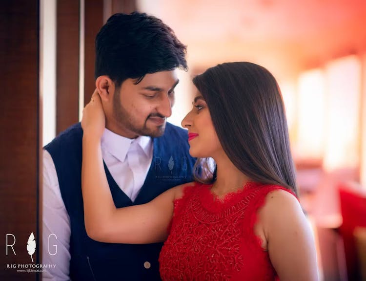 Couple posing in a romantic way for pre wedding photography