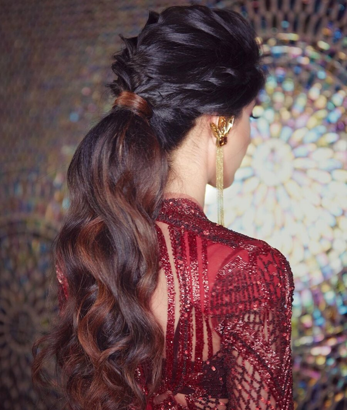 braided-bun-hairstyle-for-gown-for-medium-hair | WedAbout