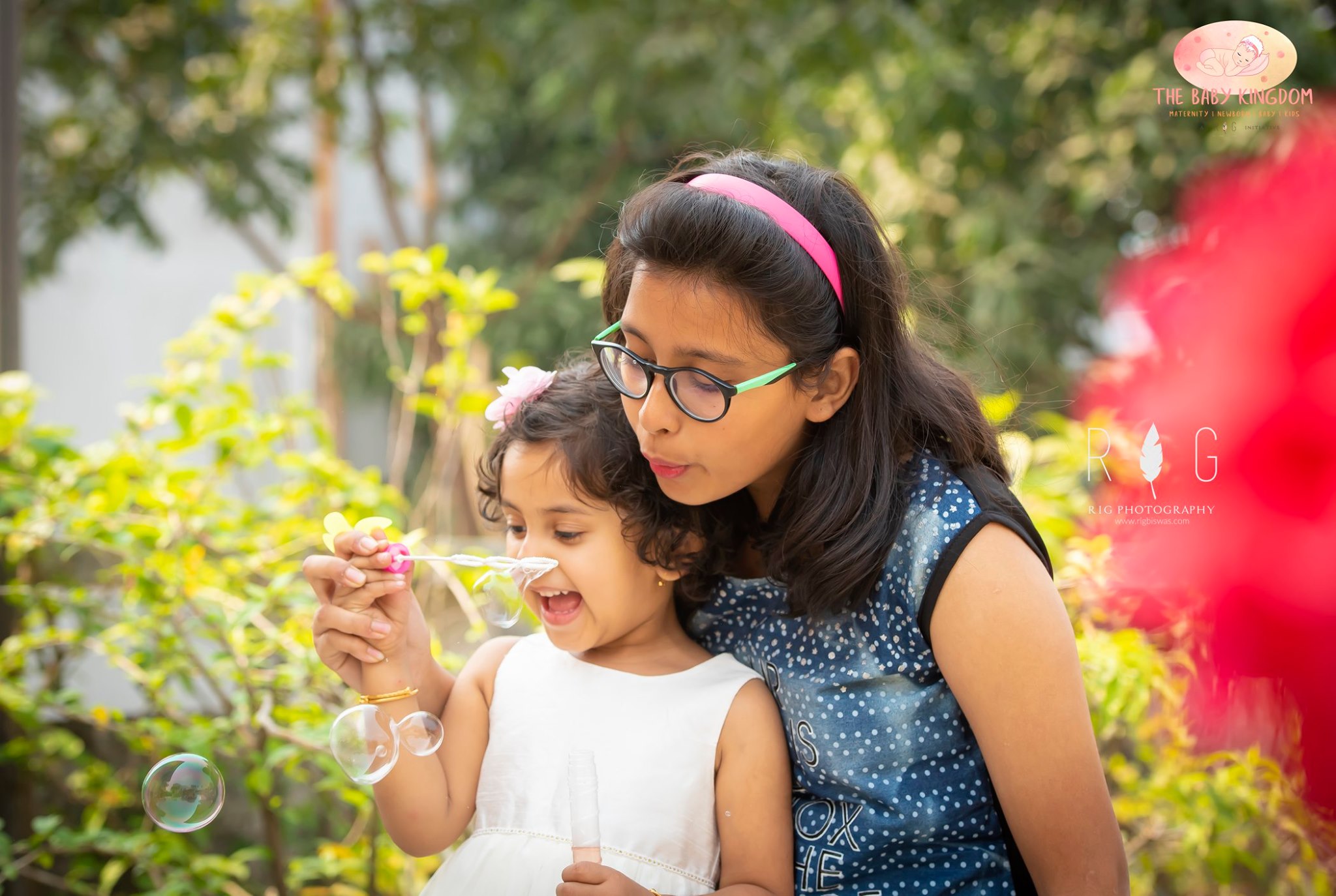 baby photoshoot with parents