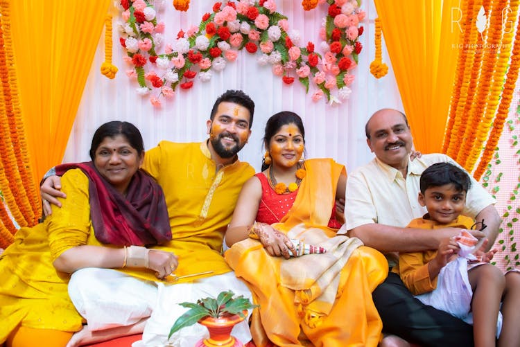 haldi poses with family