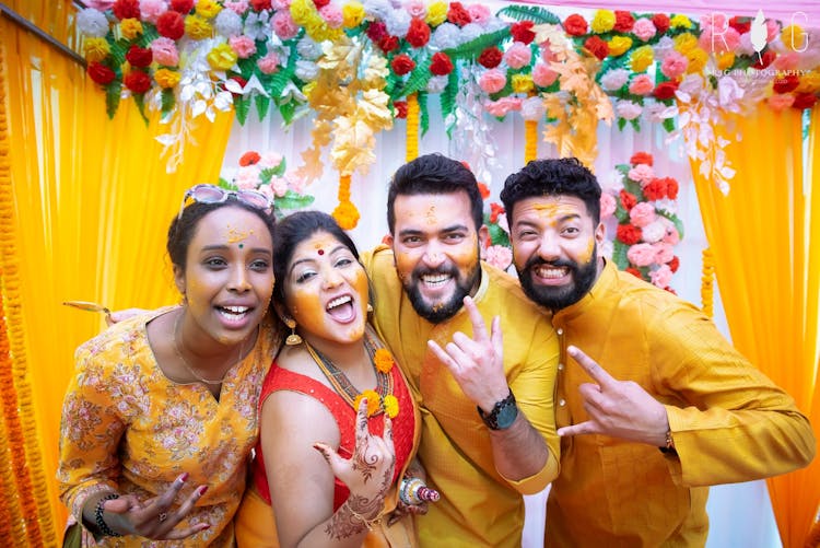 haldi poses with friends