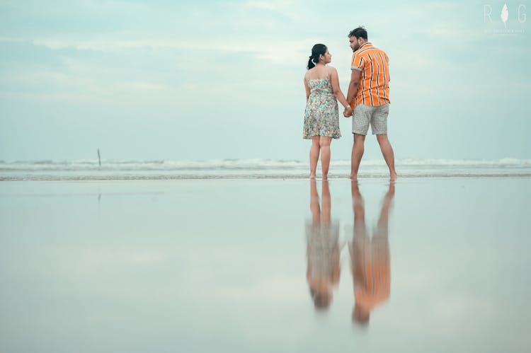 Couple poses for prewedding photoshoot
