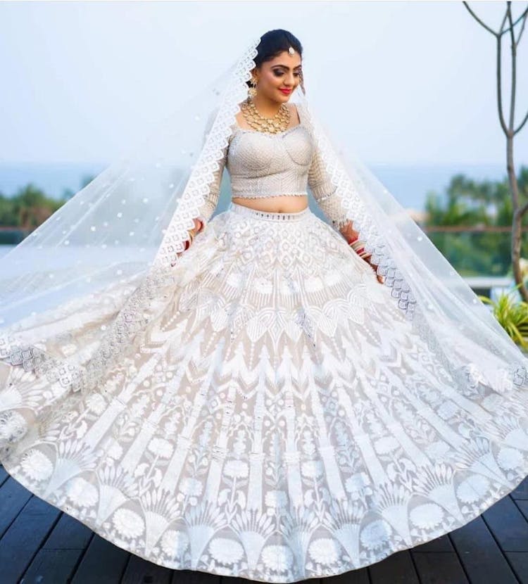 Serene floral white bridal lehenga